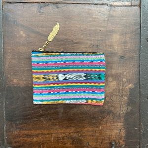 Super cool, unique fully lined mini zippered pouch